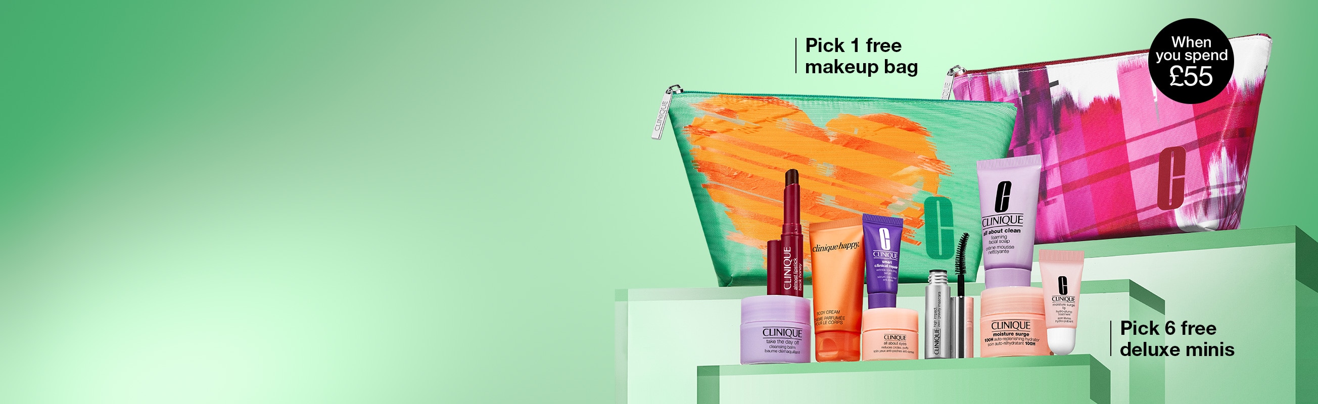 Two brightly coloured makeup bags and a selection of Clinique minis on glass stands, in front of a dynamic green background