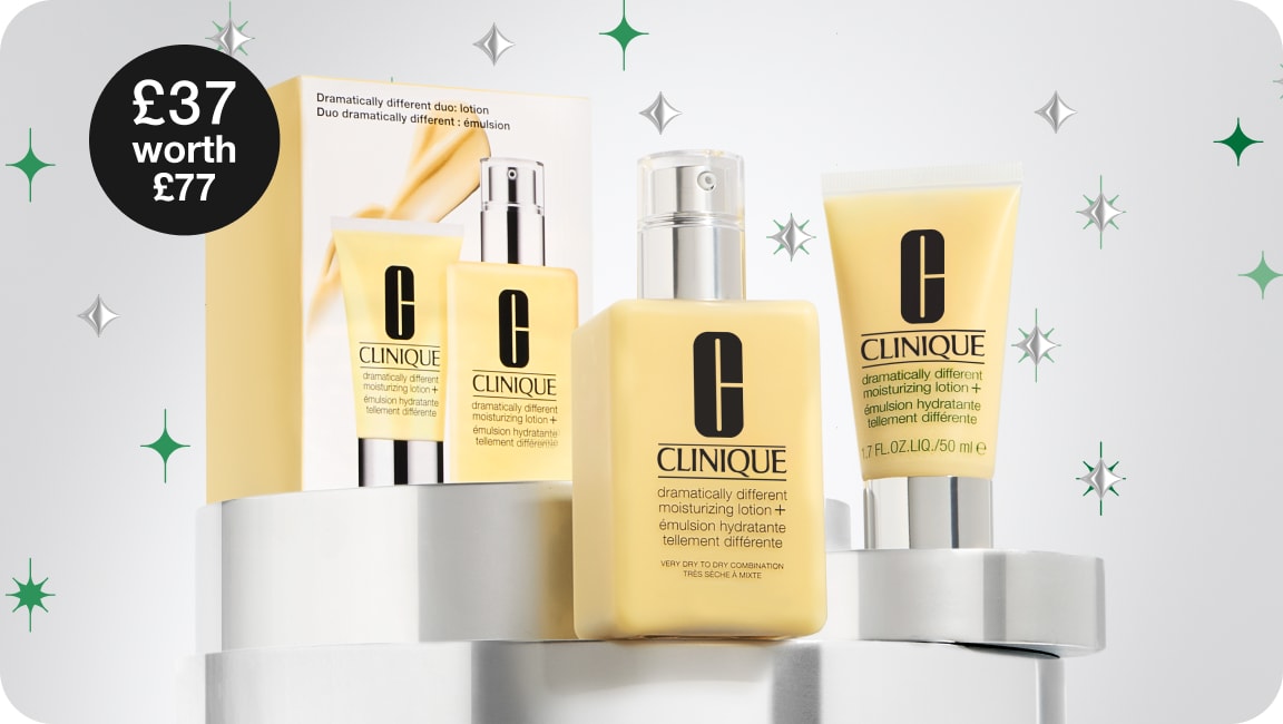 Dramatically Different Moisturiser Black Friday set, on a grey plinth, surrounded by green and silver star graphics